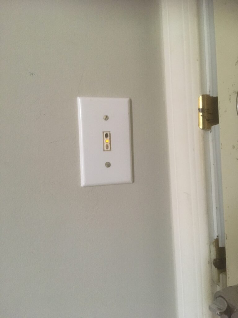 Example of a Touchless Light Switch by the garage door