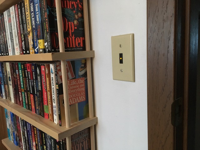 Working Touchless Light Switch by the paperback bookshelf